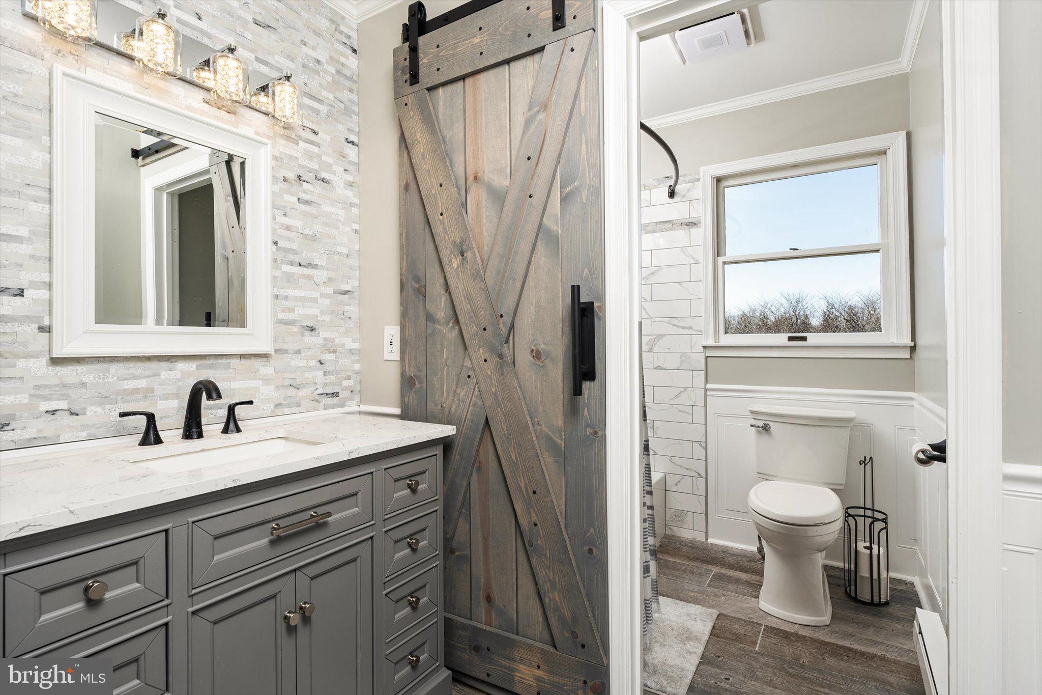 756 Province Line Road Allentown, NJ 08501 - Photo 28 of 41 a bathroom with a toilet sink and mirror