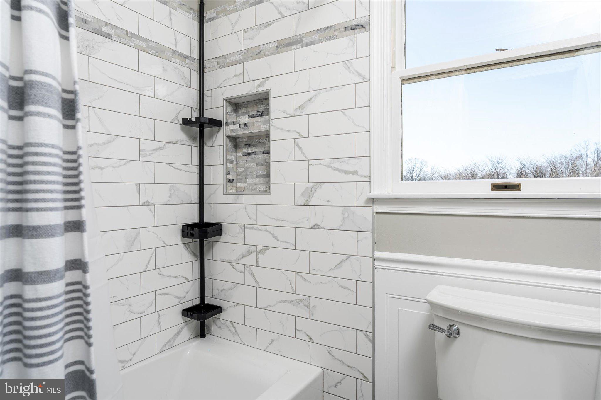 756 Province Line Road Allentown, NJ 08501 - Photo 29 of 41 a bathroom with a sink a toilet and shower