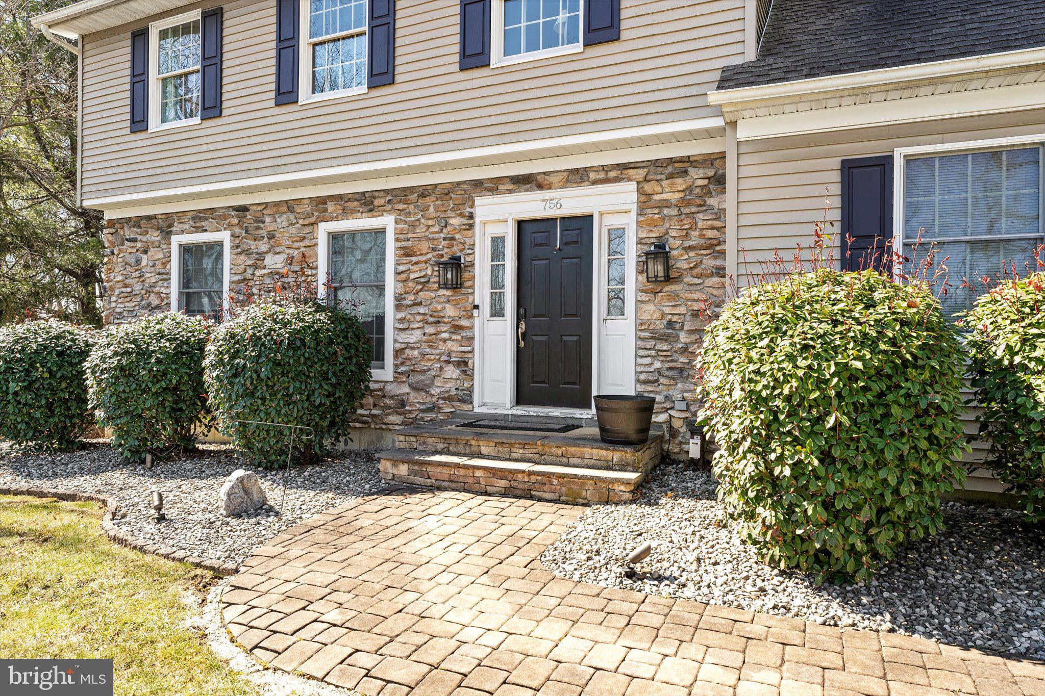 756 Province Line Road Allentown, NJ 08501 - Photo 4 of 41 a view of a house with potted plants