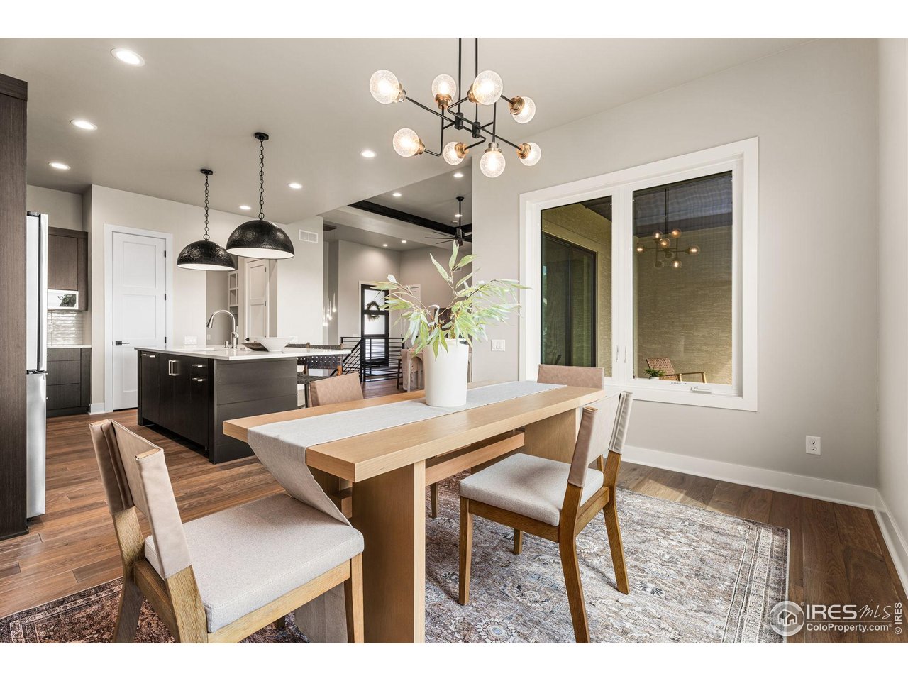 6719 Morning Song Court Timnath, CO 80547 - Photo 11 of 43 Bright dining space with room to gather