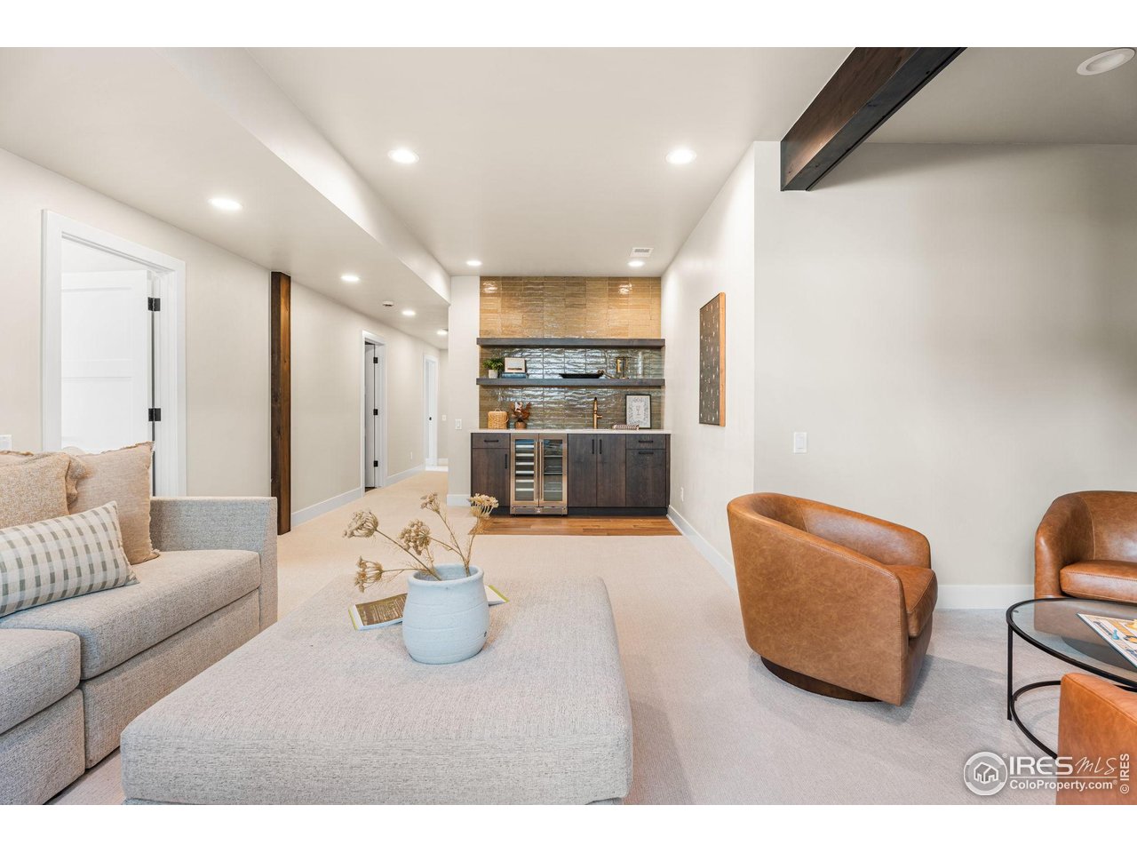6719 Morning Song Court Timnath, CO 80547 - Photo 24 of 43 Spacious downstairs retreat with wet bar