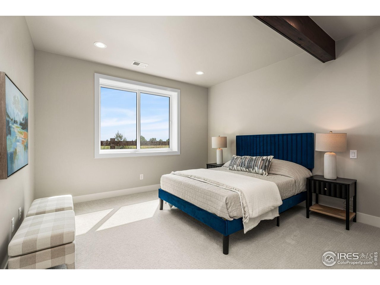 6719 Morning Song Court Timnath, CO 80547 - Photo 25 of 43 Comfortable downstairs bedroom for guests