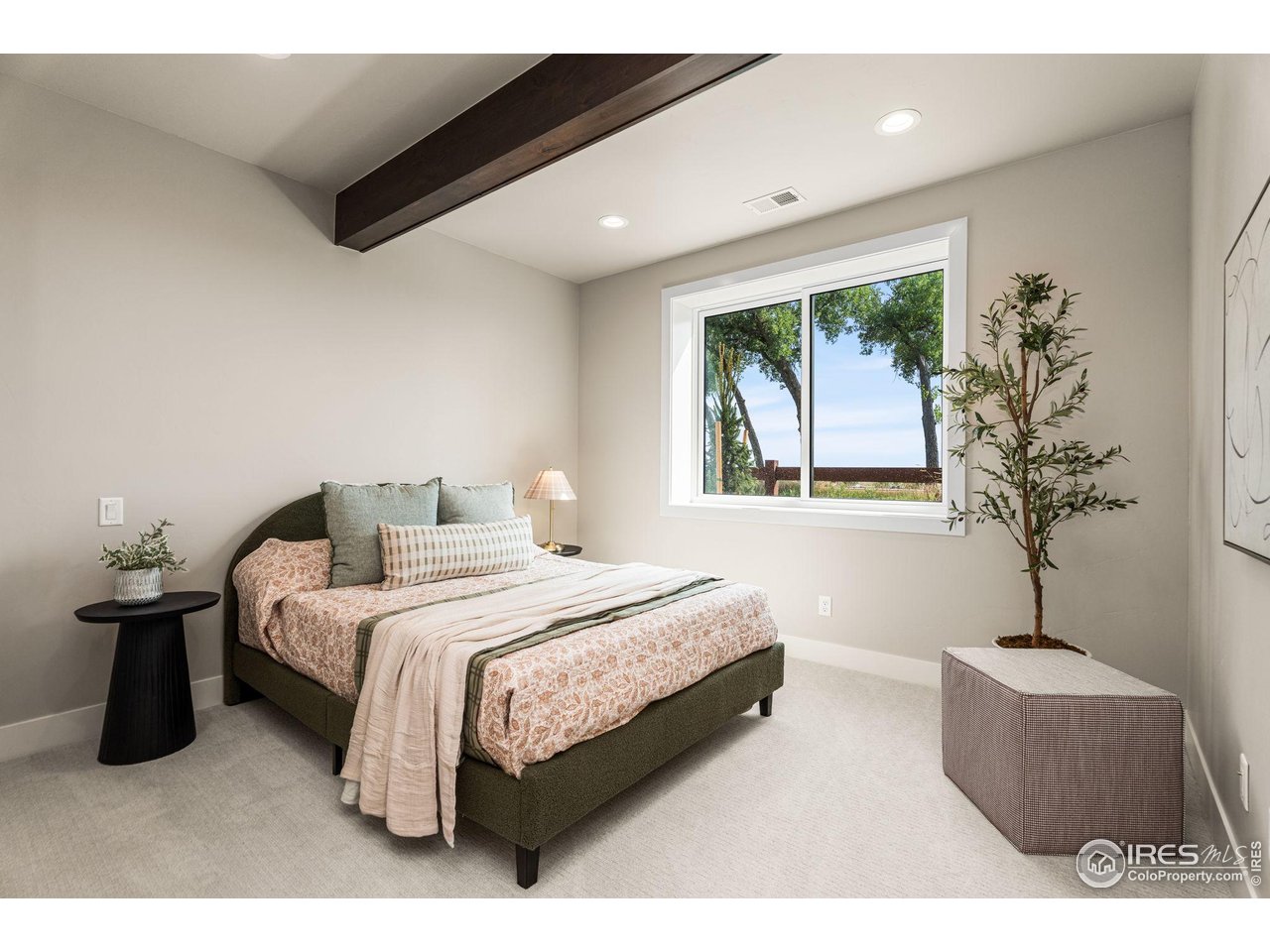 6719 Morning Song Court Timnath, CO 80547 - Photo 29 of 43 Second beautifully finished basement bedroom
