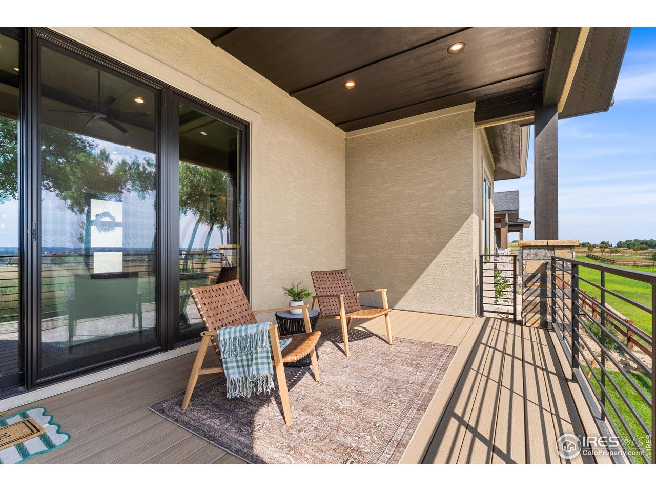 6719 Morning Song Court Timnath, CO 80547 - Photo 33 of 43 Cozy up on the deck on those cool fall nights