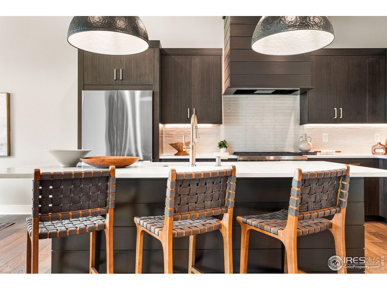 6719 Morning Song Court Timnath, CO 80547 - Photo 5 of 43 Eat-in kitchen with sparkling new appliances