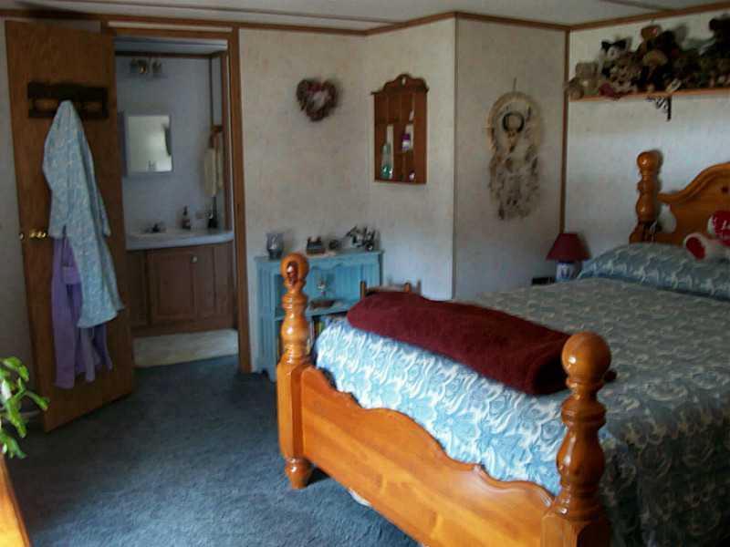231 Wing Road Hermon, ME 04401 - Photo 17 of 30 Master Bedroom.