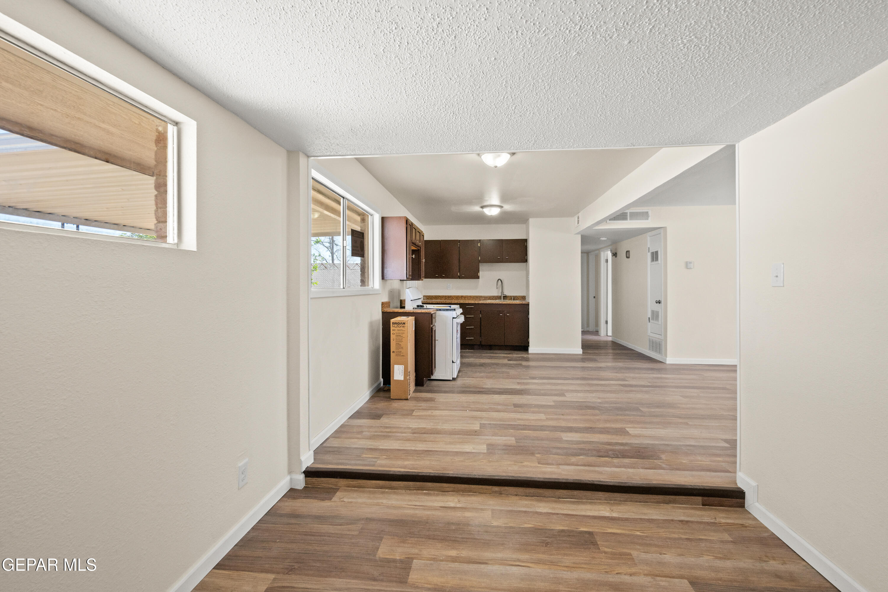 9220 Raleigh Drive El Paso, TX 79924 - Photo 17 of 23 a view of kitchen with wooden floor