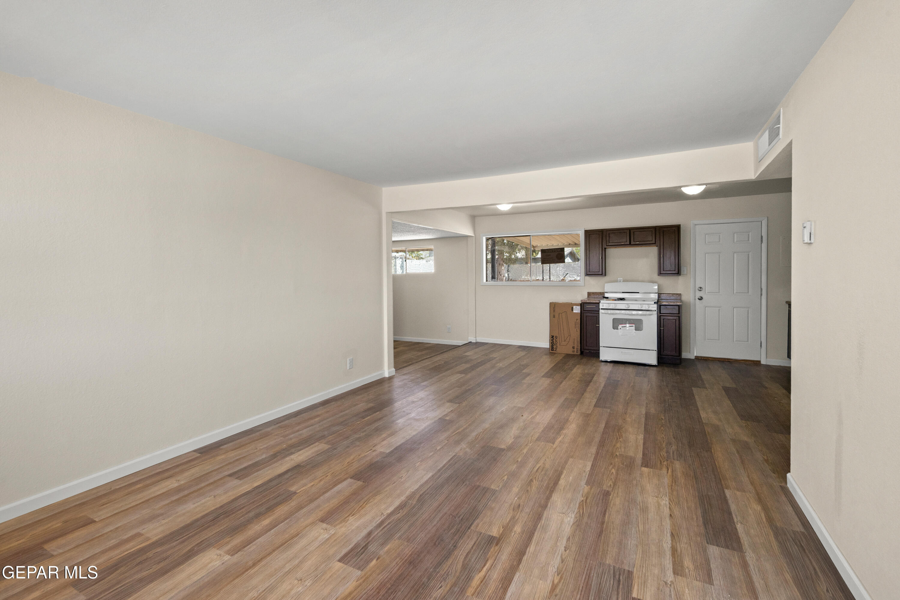 9220 Raleigh Drive El Paso, TX 79924 - Photo 5 of 23 a view of empty room with wooden floor