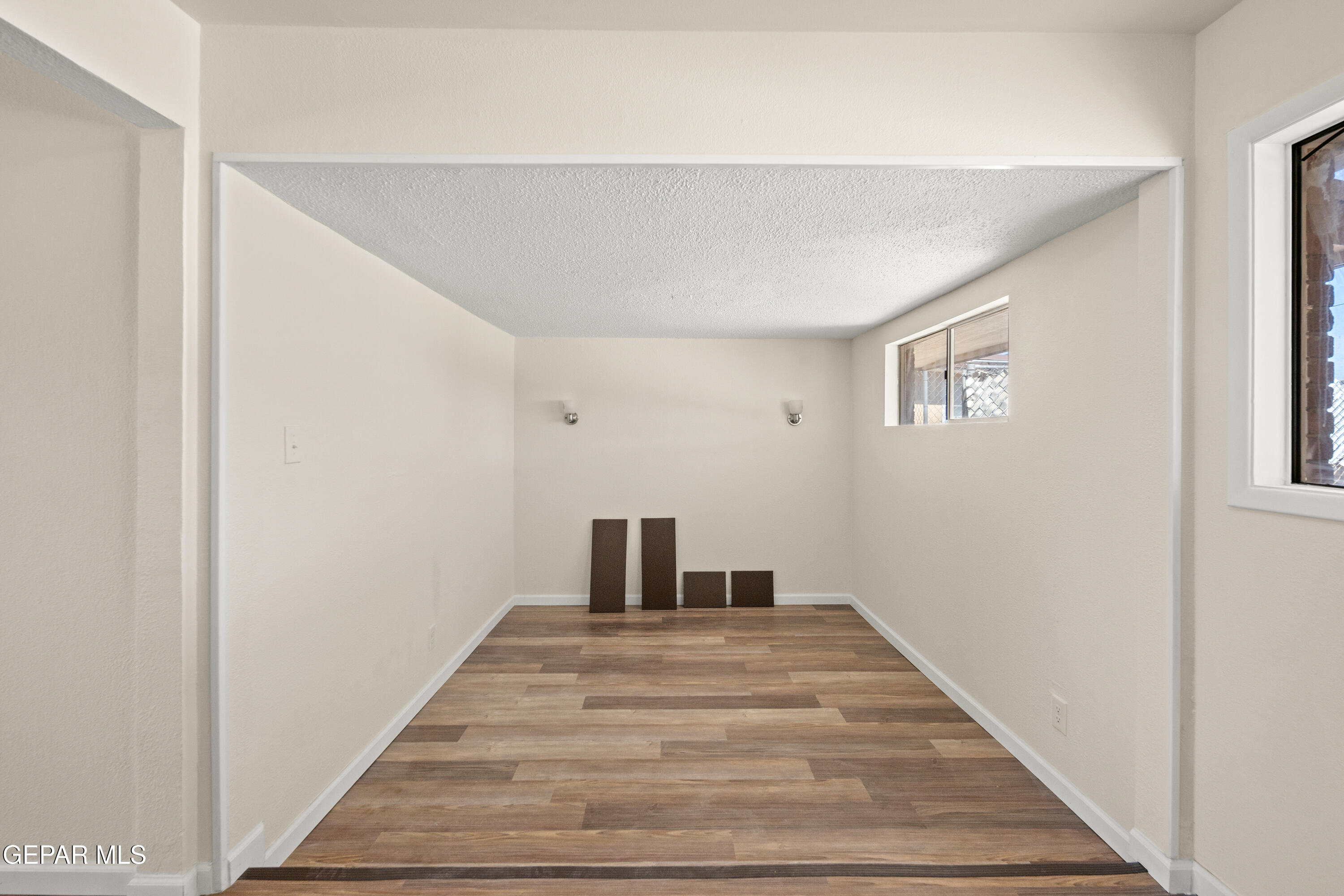 9220 Raleigh Drive El Paso, TX 79924 - Photo 8 of 23 a bedroom with a bed and a window