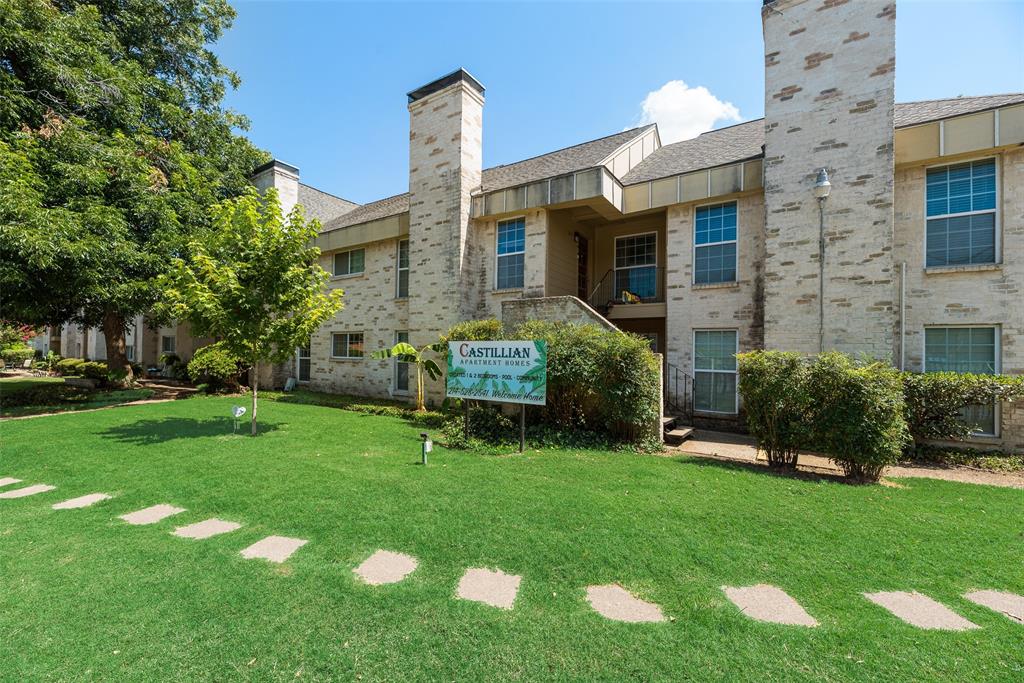 5109 Cedar Springs Road, Unit 105 Dallas, TX 75235 - Photo 1 of 16 Exterior facade featuring light-colored brick, prominent chimneys, and multiple windows