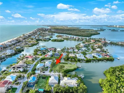 a view of a lake with a yard