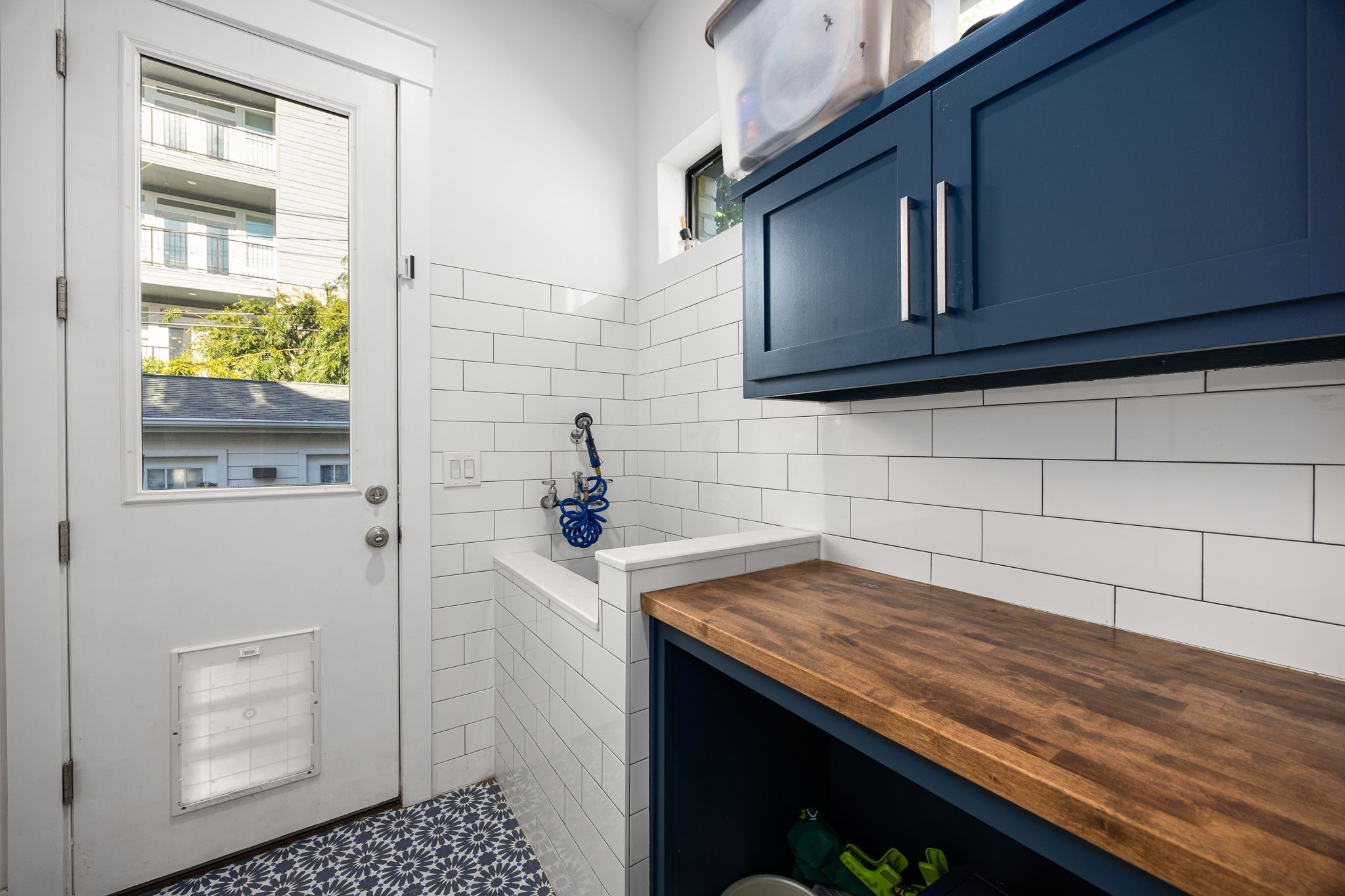 1906 Swift Boulevard Houston, TX 77030 - Photo 18 of 47 Dog washing station and half door next to Butlers Pantry.