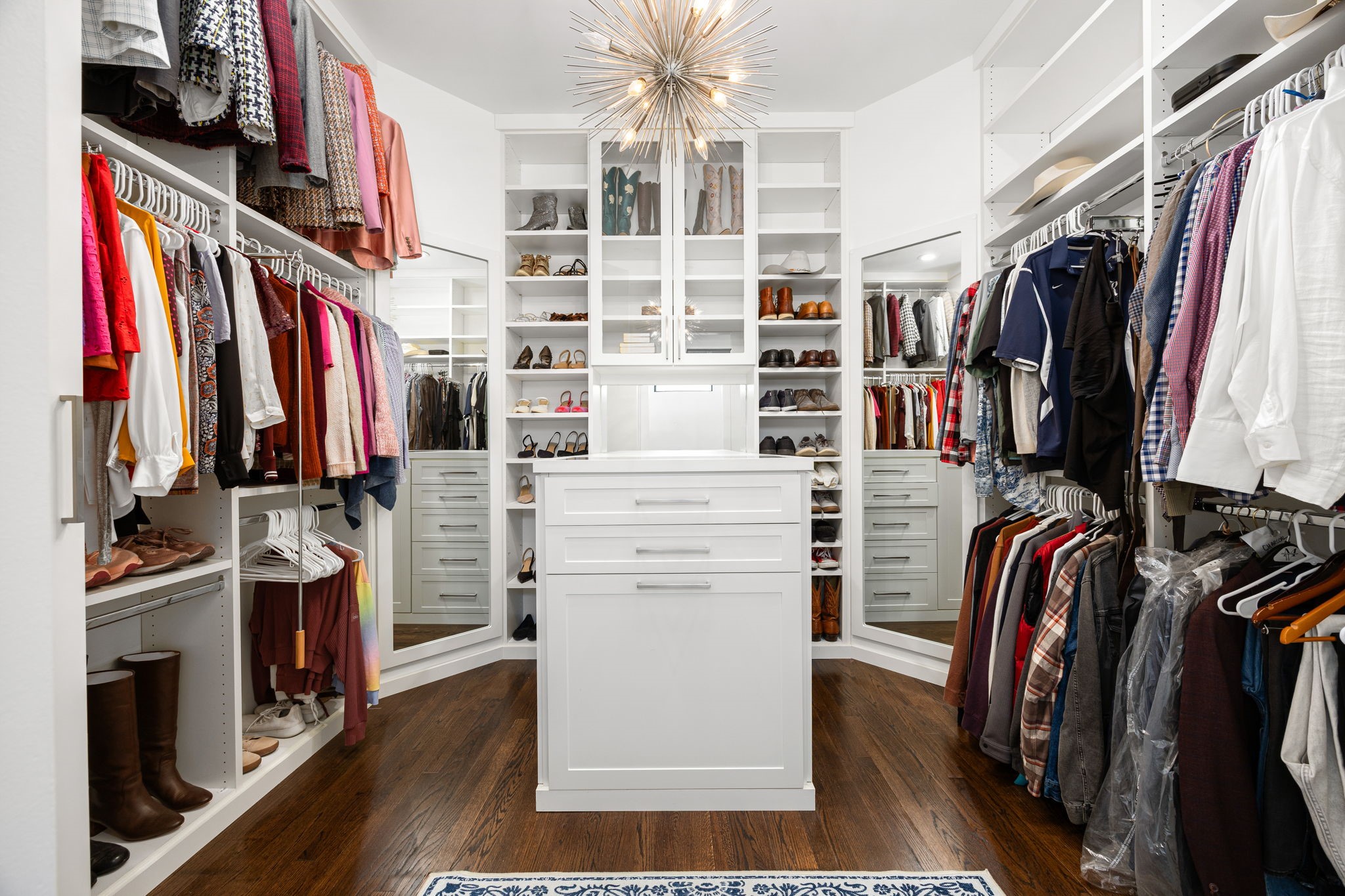 1906 Swift Boulevard Houston, TX 77030 - Photo 23 of 47 Custom designed closet including jewelry, show and drawer storage. Landry hamper is the bottom large cabinet that pulls towards you.