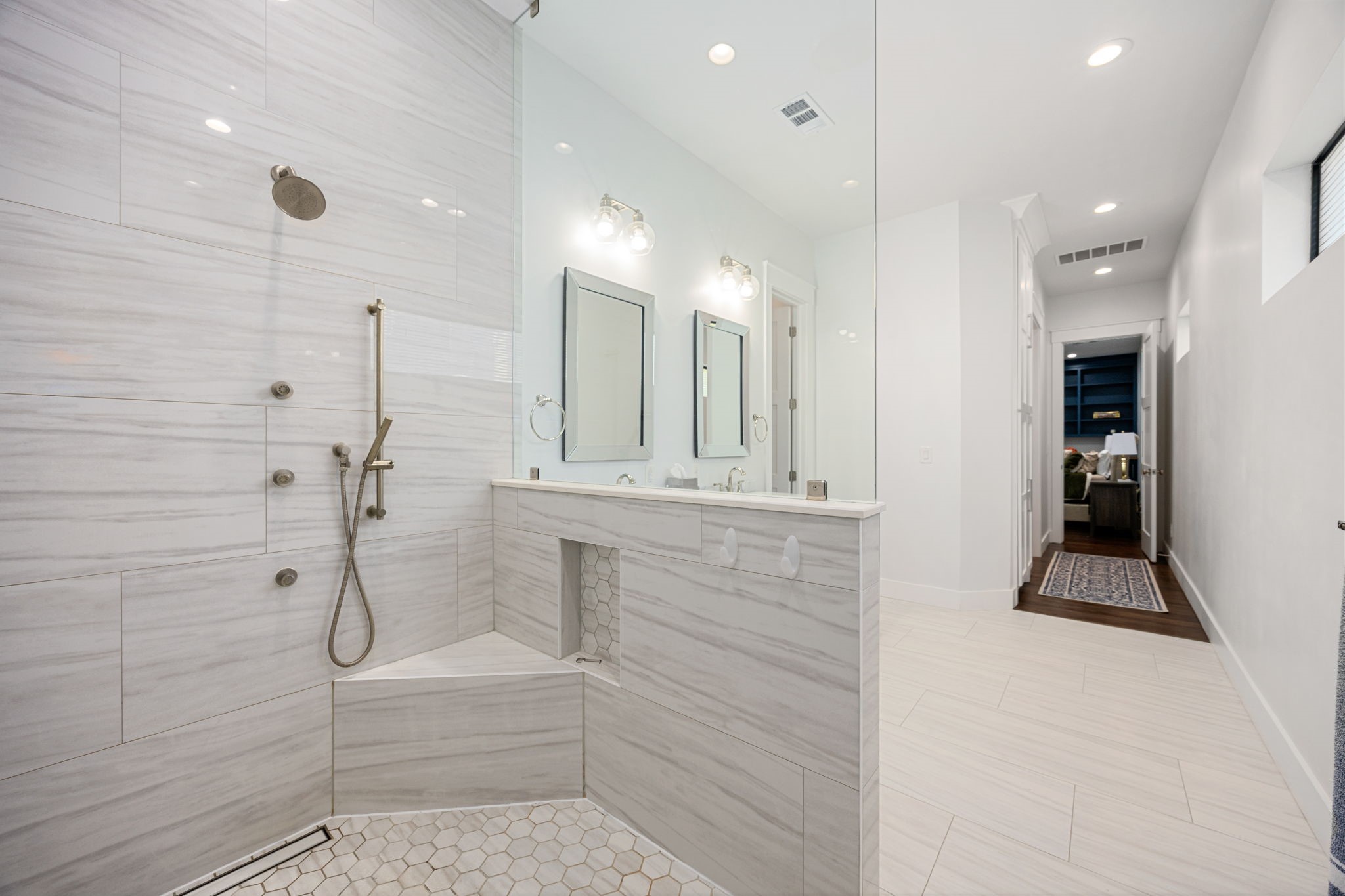 1906 Swift Boulevard Houston, TX 77030 - Photo 26 of 47 Walk-in frameless shower. Built in seat, multiple body sprayers, linear drain for modern appeal.