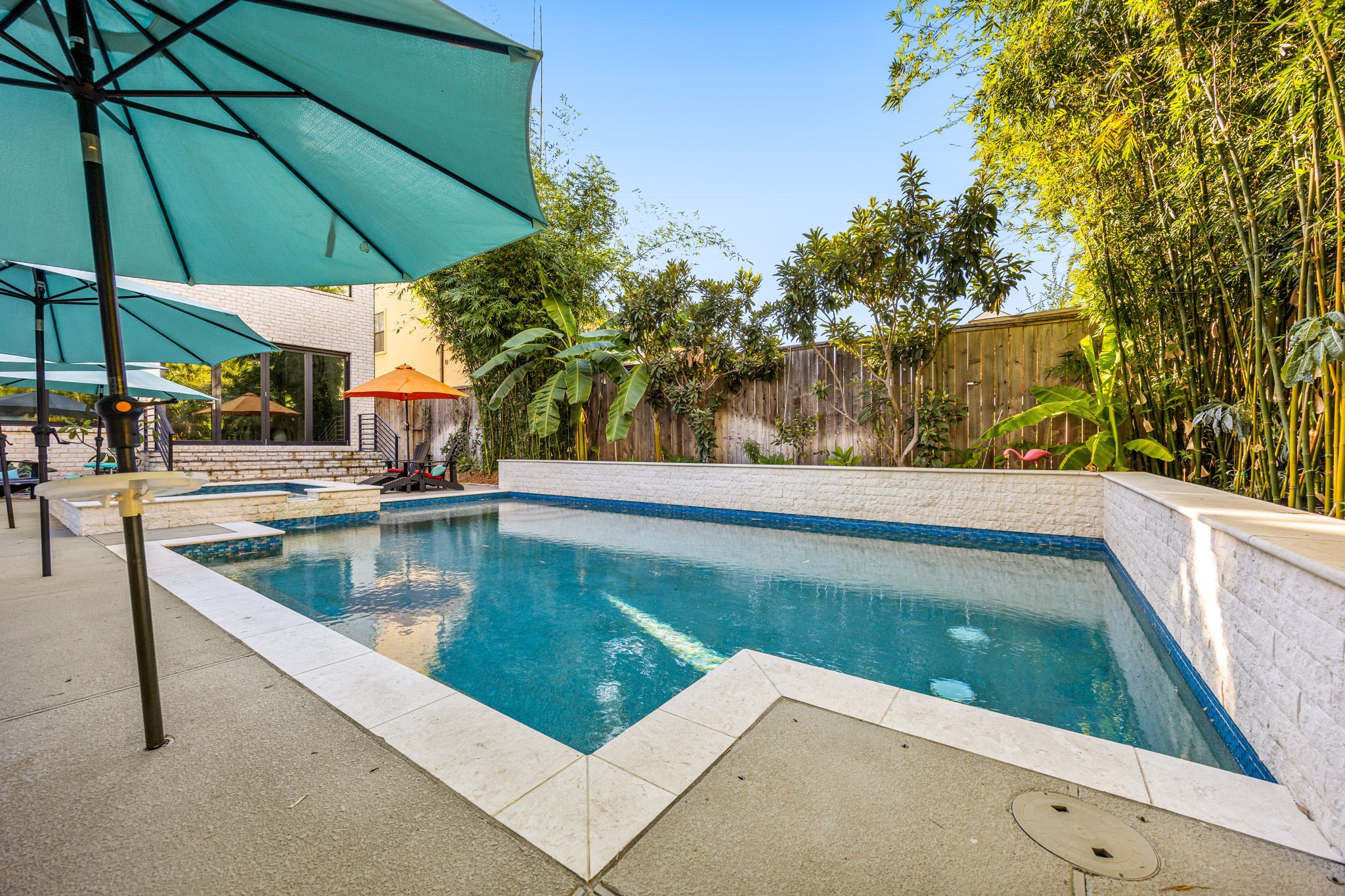1906 Swift Boulevard Houston, TX 77030 - Photo 42 of 47 Heated and salt water pool, 18 x 30 feet, 3 feet slope to 5 feet, Custom Catch-a-kid Pool Netting for safety.