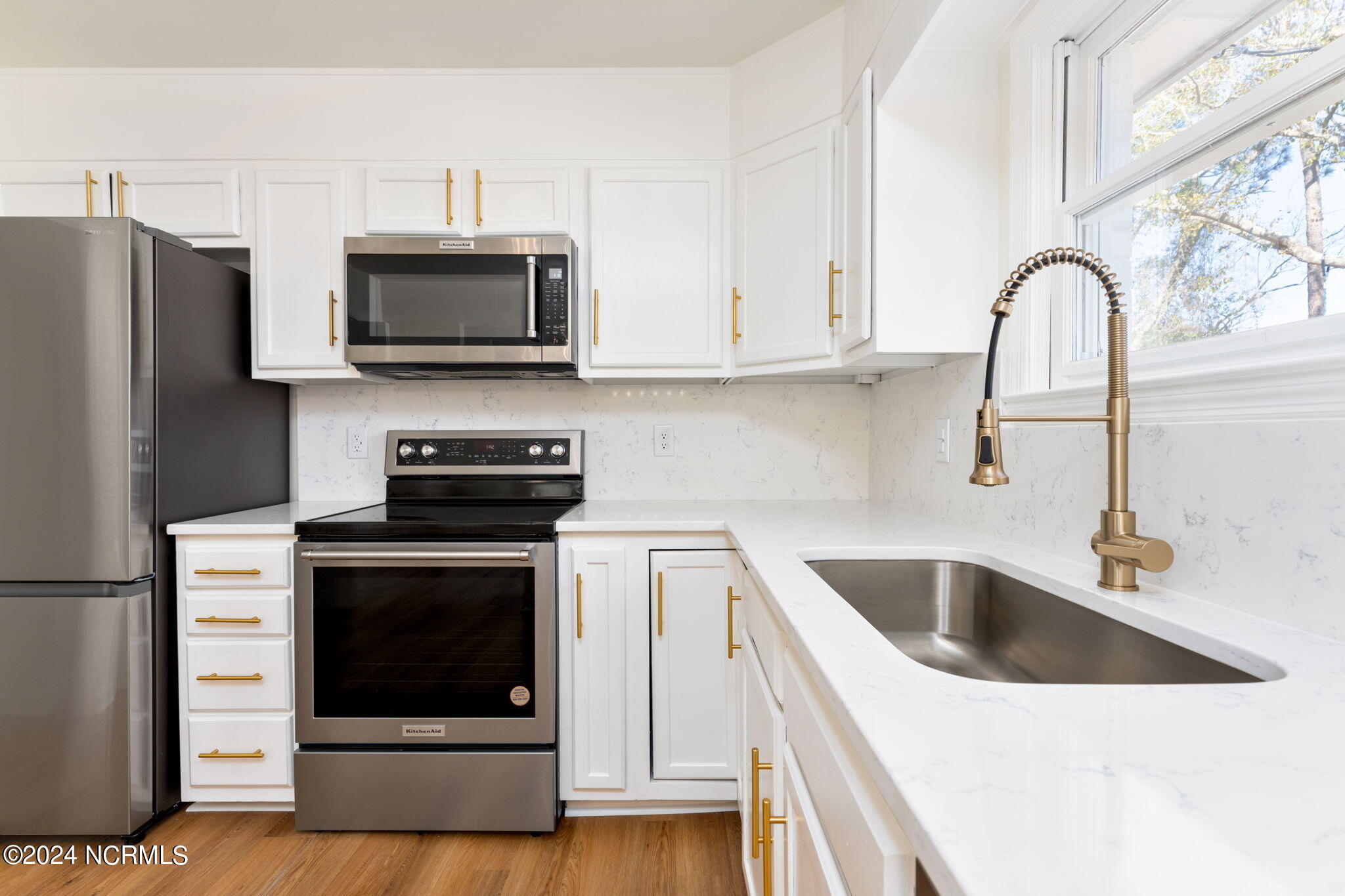 229 2 Chopt Road Wilmington, NC 28405 - Photo 26 of 73 That deep-basin sink and gold faucet!