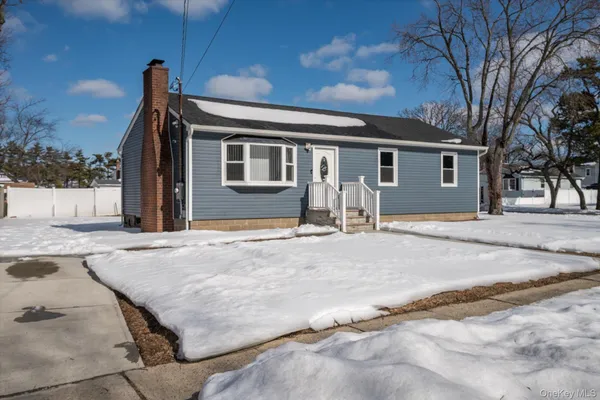 a house view with a backyard space