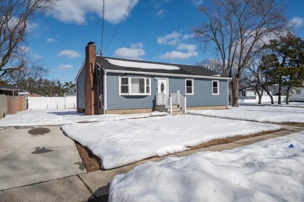 a house with trees in front of it