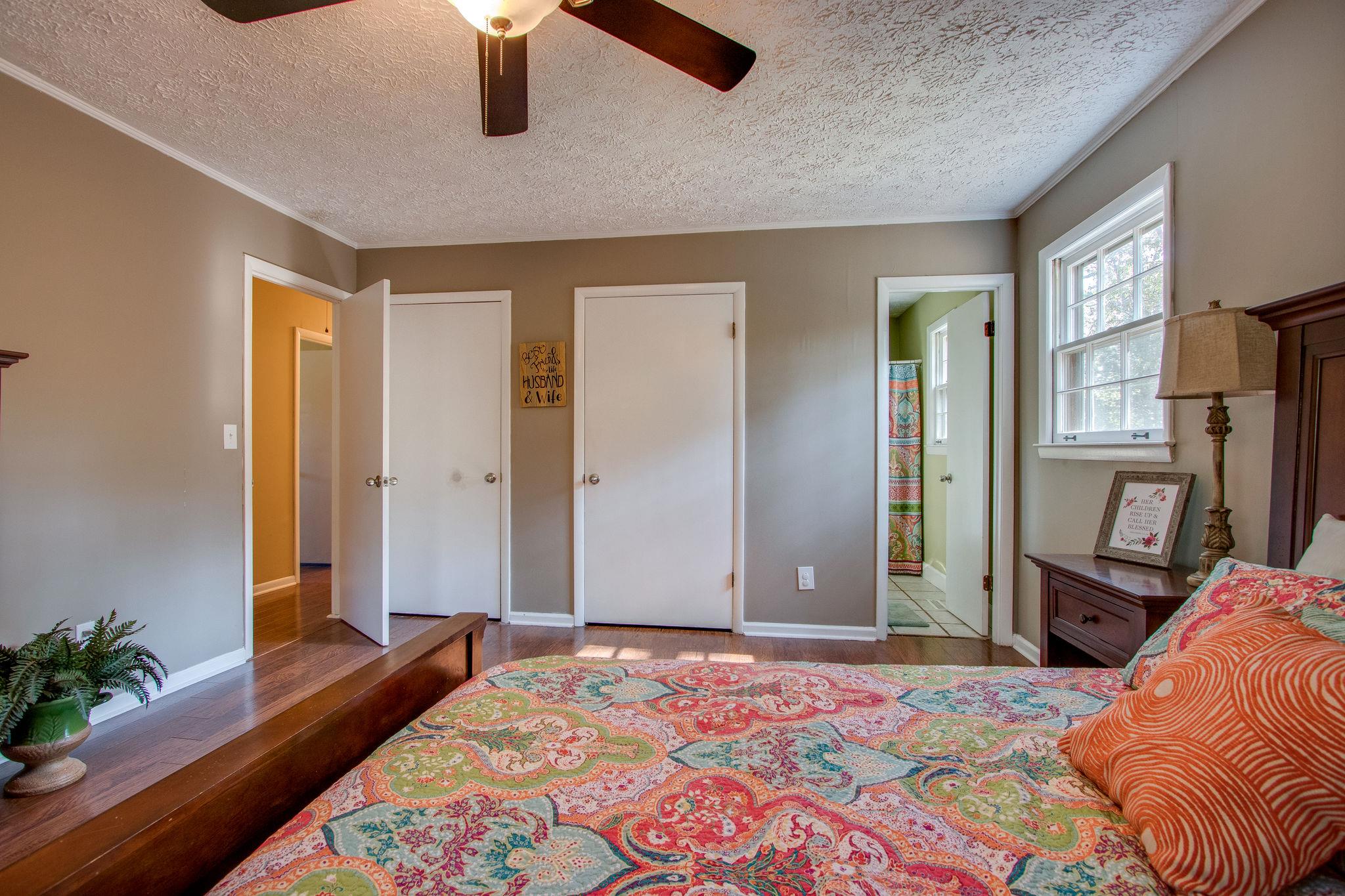 835 Beasleys Bend Road Lebanon, TN 37087 - Photo 19 of 33 a bedroom with a bed dresser and a large mirror