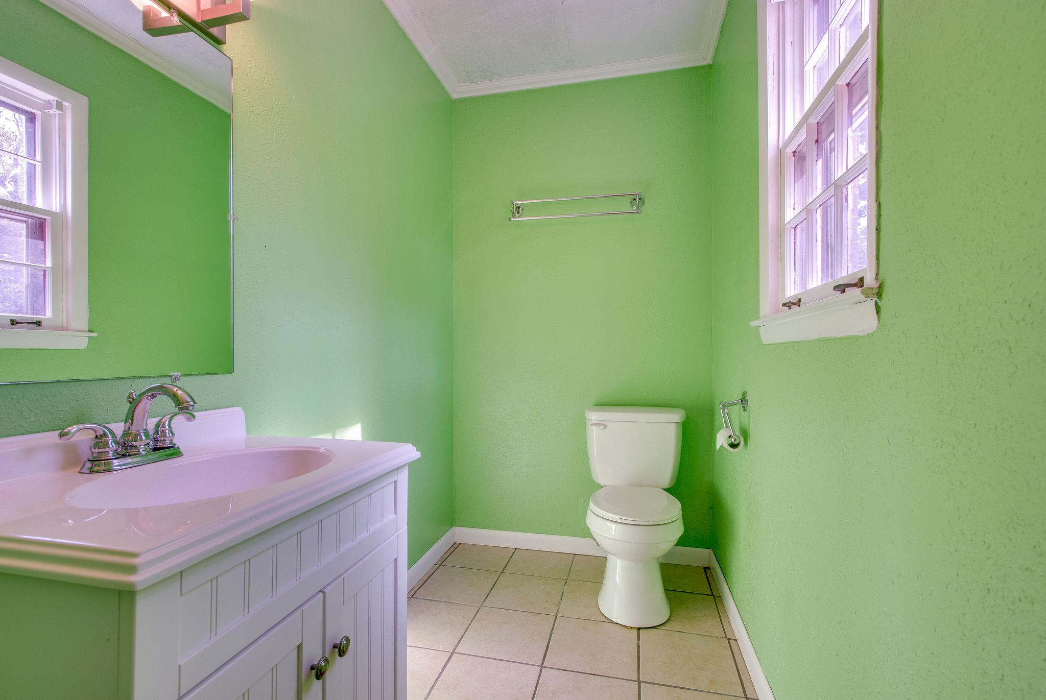835 Beasleys Bend Road Lebanon, TN 37087 - Photo 31 of 33 a bathroom with a sink a toilet and mirror