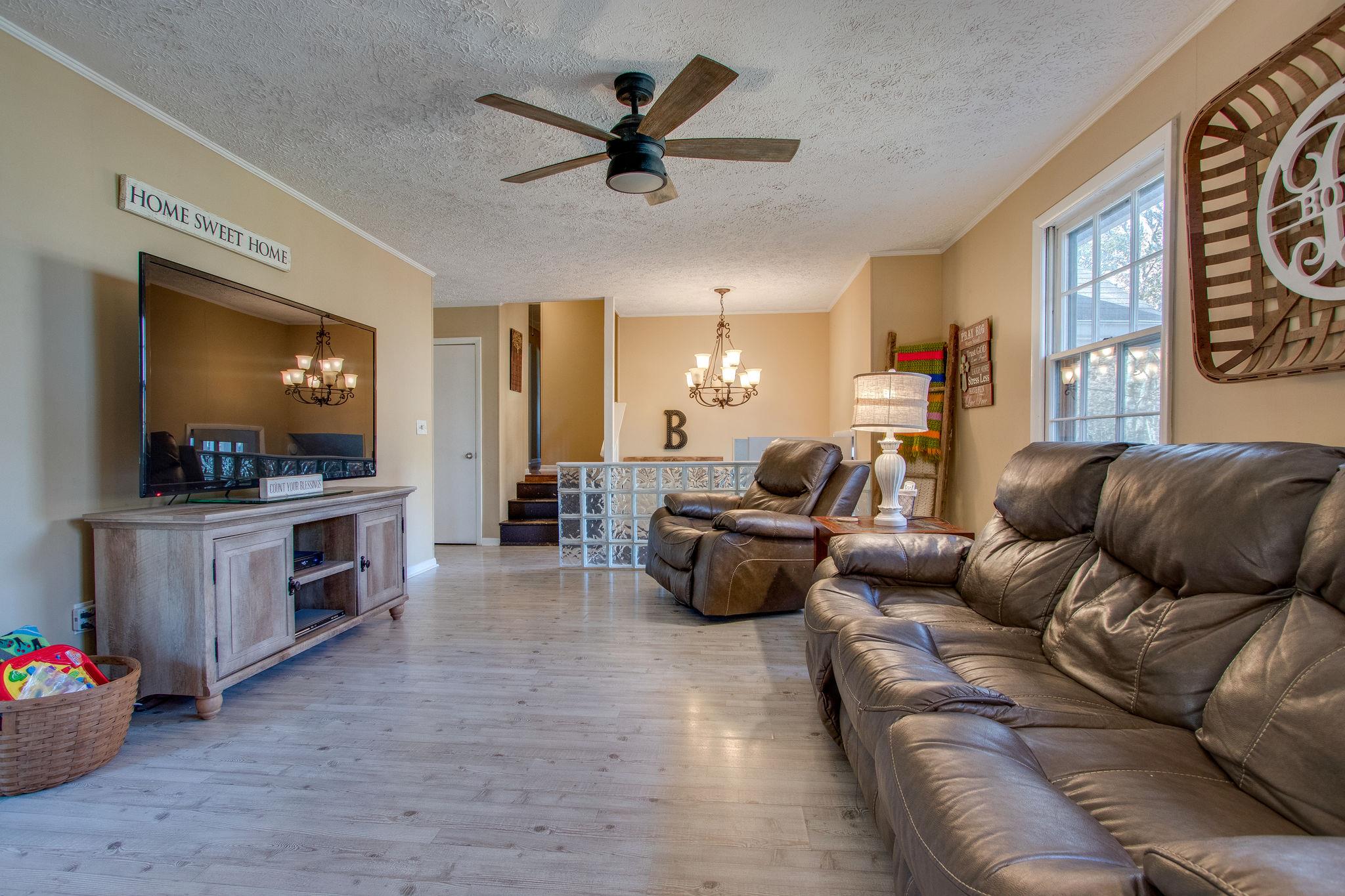 835 Beasleys Bend Road Lebanon, TN 37087 - Photo 10 of 33 a living room with furniture and a flat screen tv