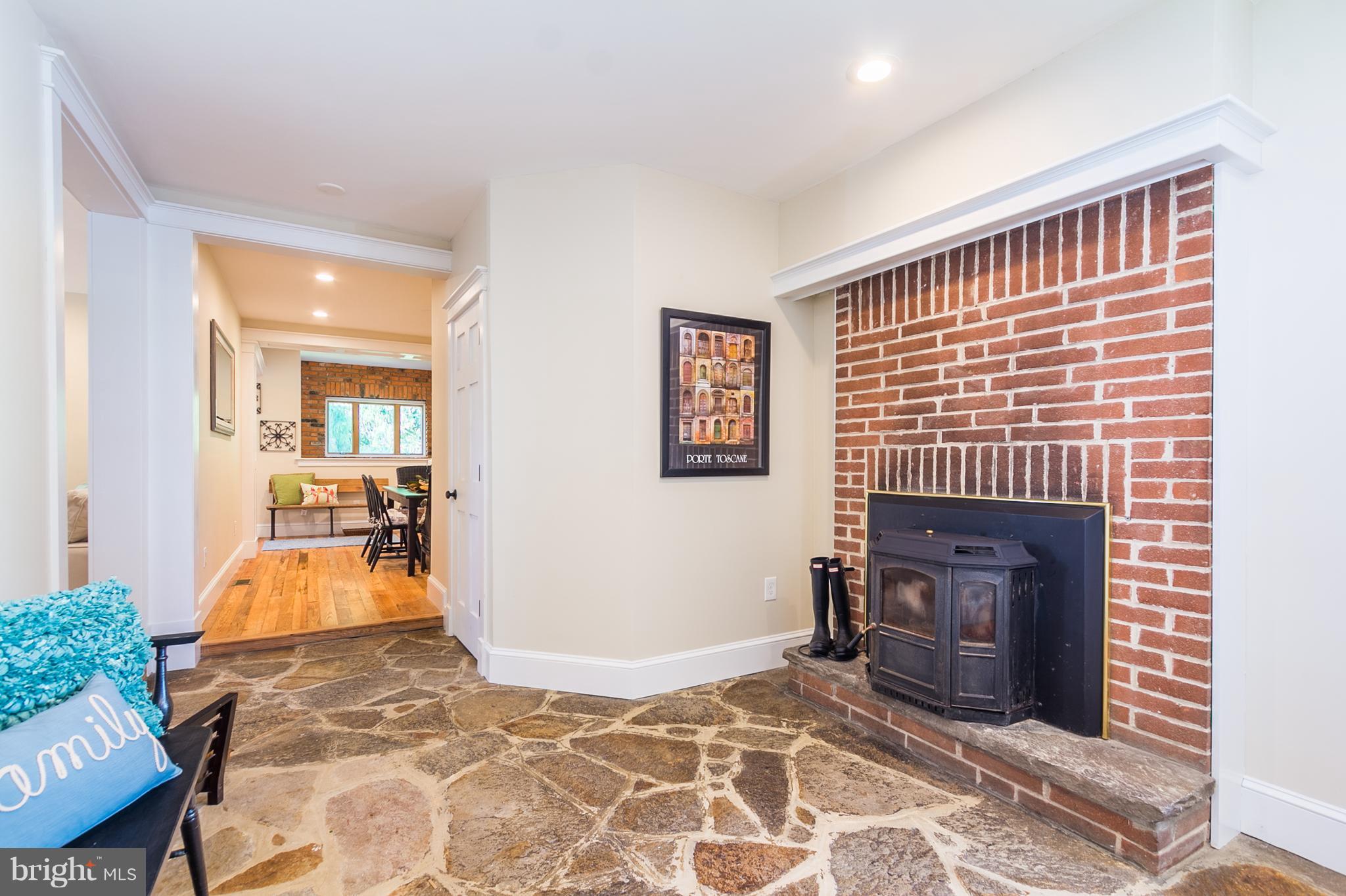 2551 Old Frederick Road Baltimore, MD 21228 - Photo 26 of 30 Mud Room w/ Pellet Stove (Sold AS IS)
