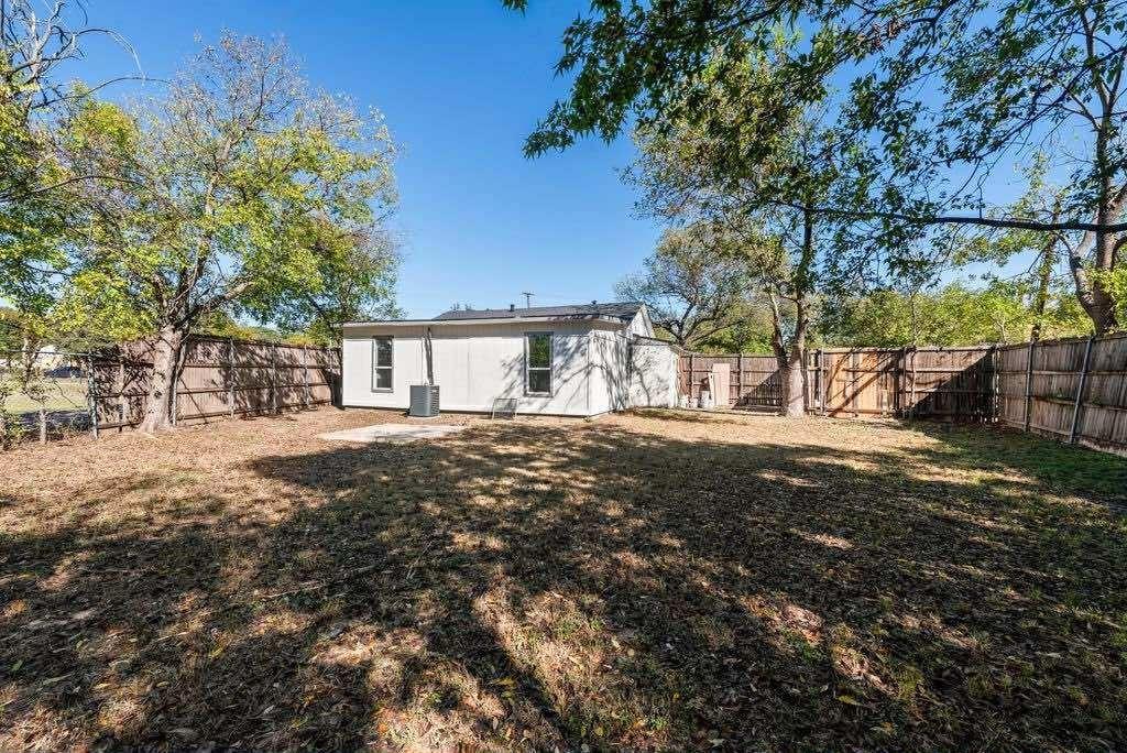 1802 Gus Thomasson Road Dallas, TX 75228 - Photo 3 of 17 a view of house with backyard