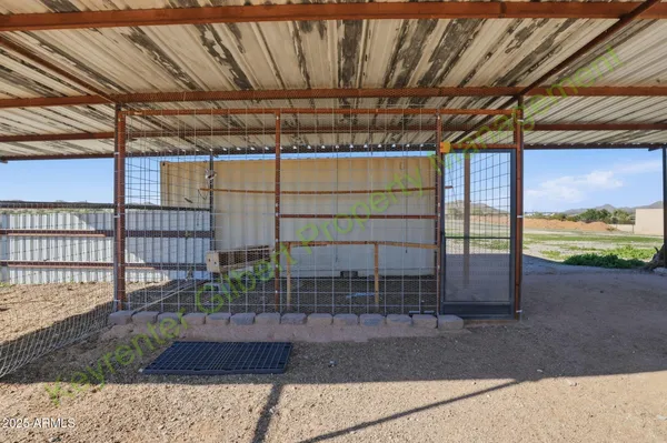 an aerial view of residential houses and outdoor space