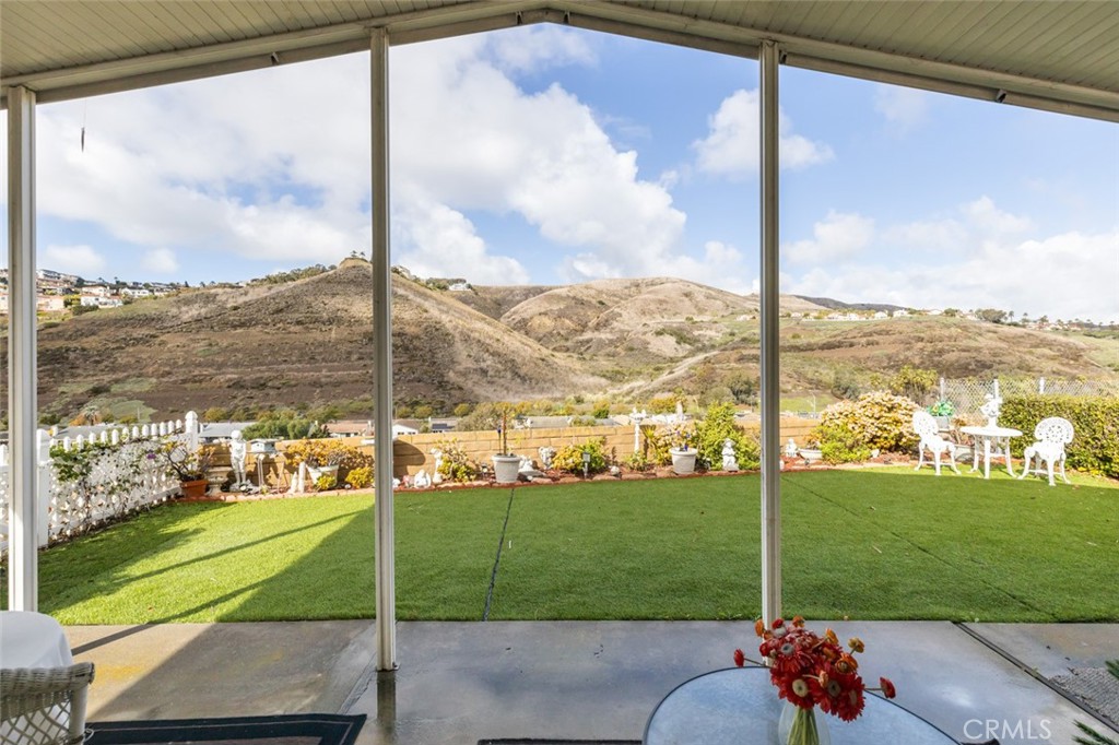 a view of a porch and yard