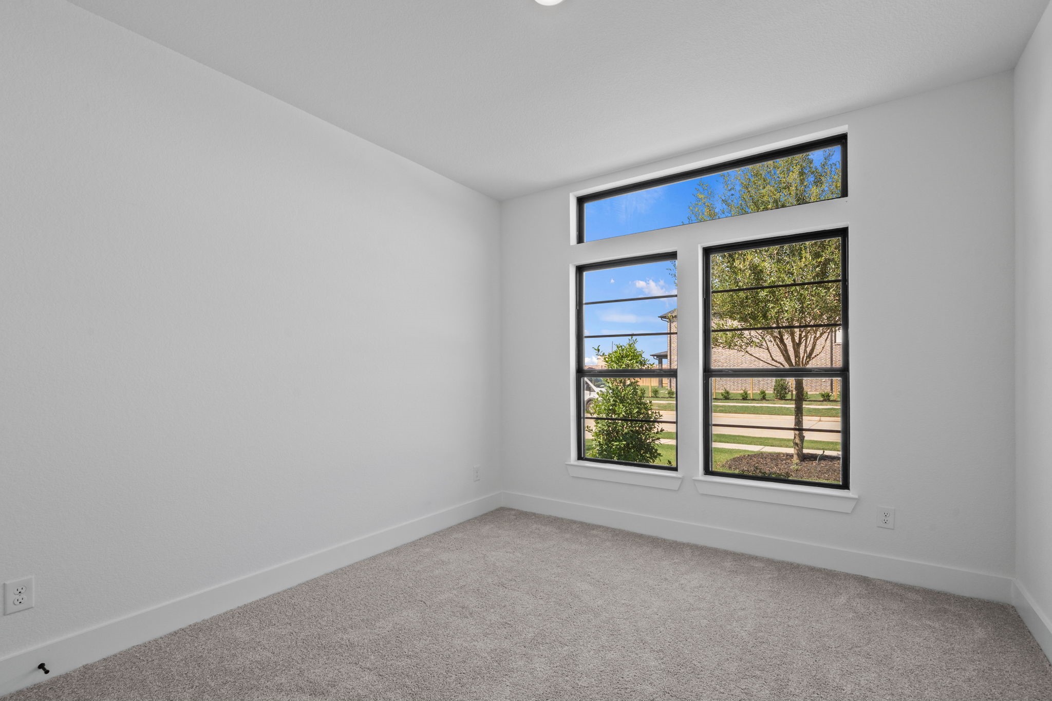446 Silver Moon Way Katy, TX 77493 - Photo 2 of 34 Beautiful functional windows in the front bedroom 1st floor.