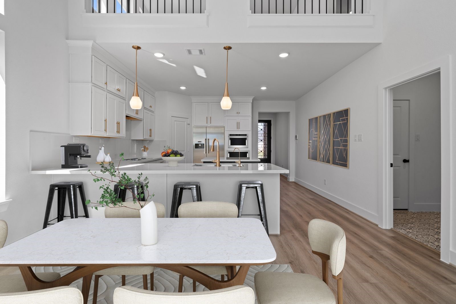 446 Silver Moon Way Katy, TX 77493 - Photo 5 of 34 The causal eating area is perfectly located in this open concept home.