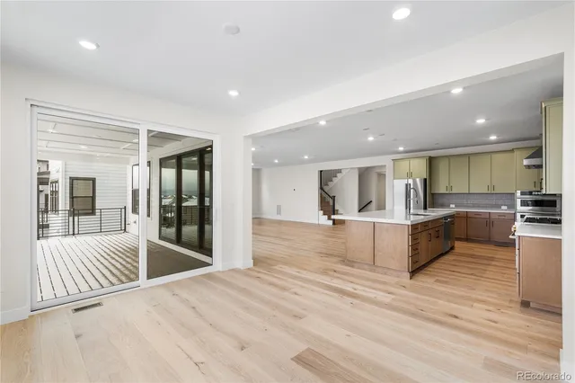 a view of kitchen with wooden floor