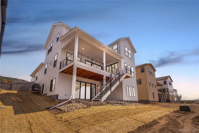 a view of a house with a snow in front of it