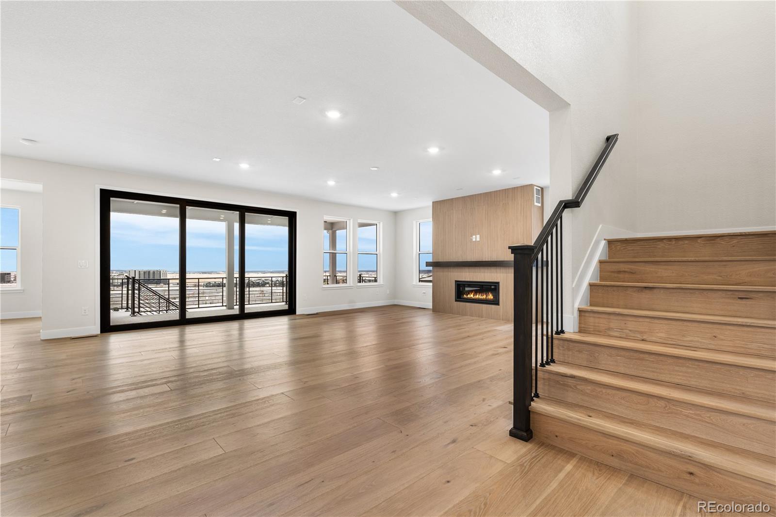 11303 Tenor Trail Lone Tree, CO 80134 - Photo 3 of 49 a view of entryway and hall with wooden floor