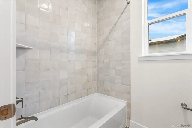 a bathroom with a bathtub