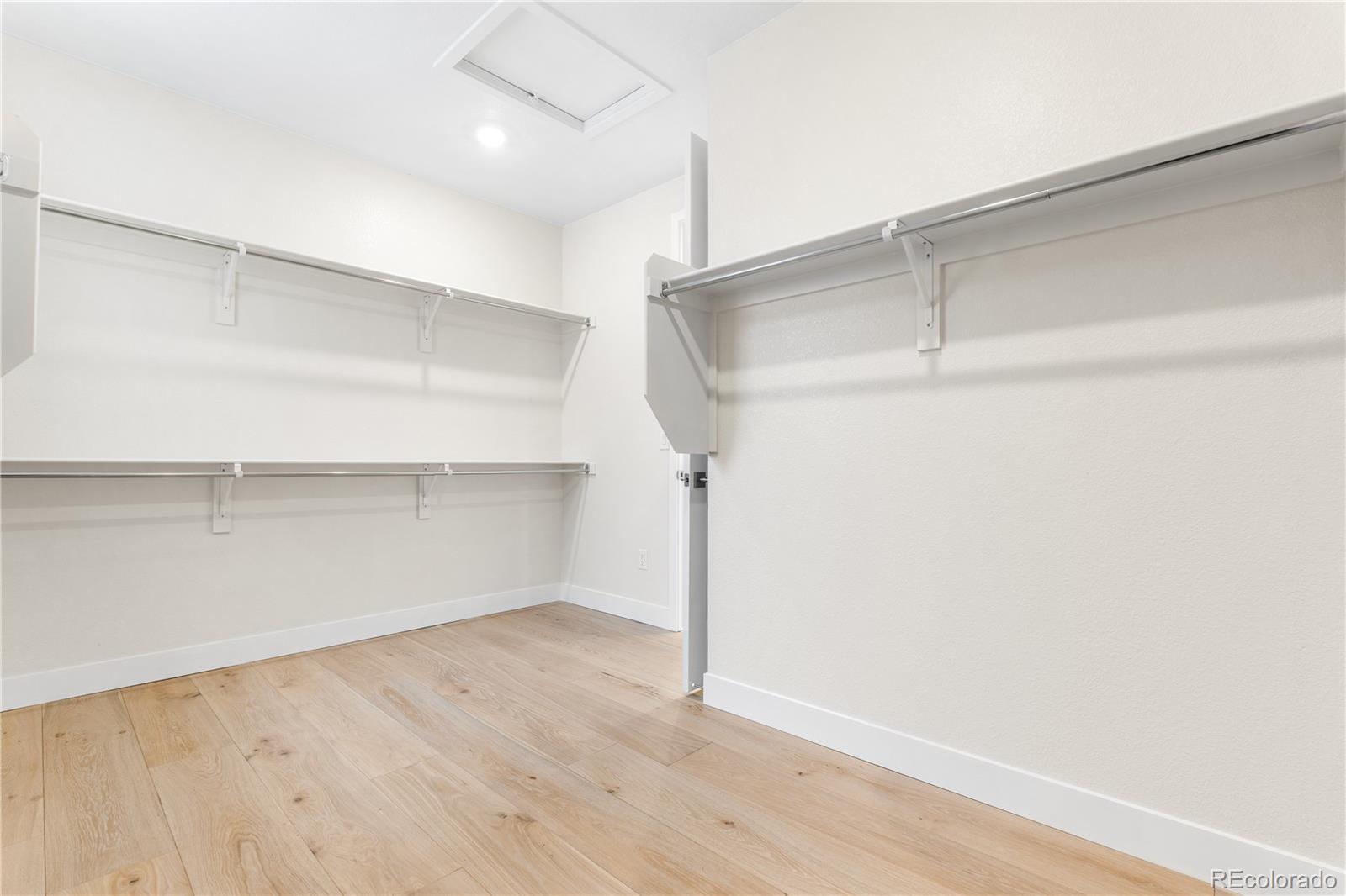 11303 Tenor Trail Lone Tree, CO 80134 - Photo 44 of 49 wooden floor in an empty room
