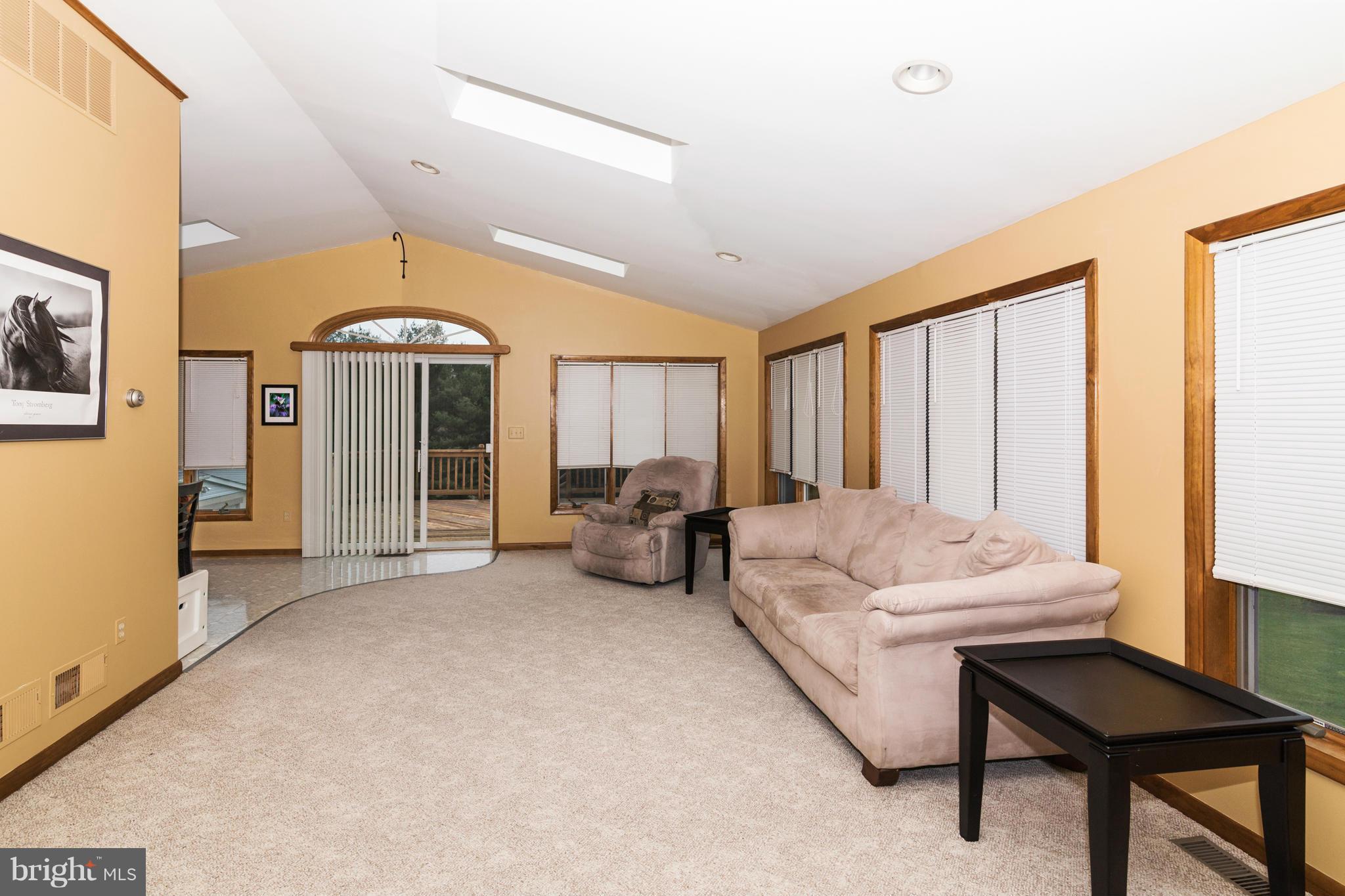 4201 Buffalo Road Mount Airy, MD 21771 - Photo 14 of 29 a living room with furniture and a large window