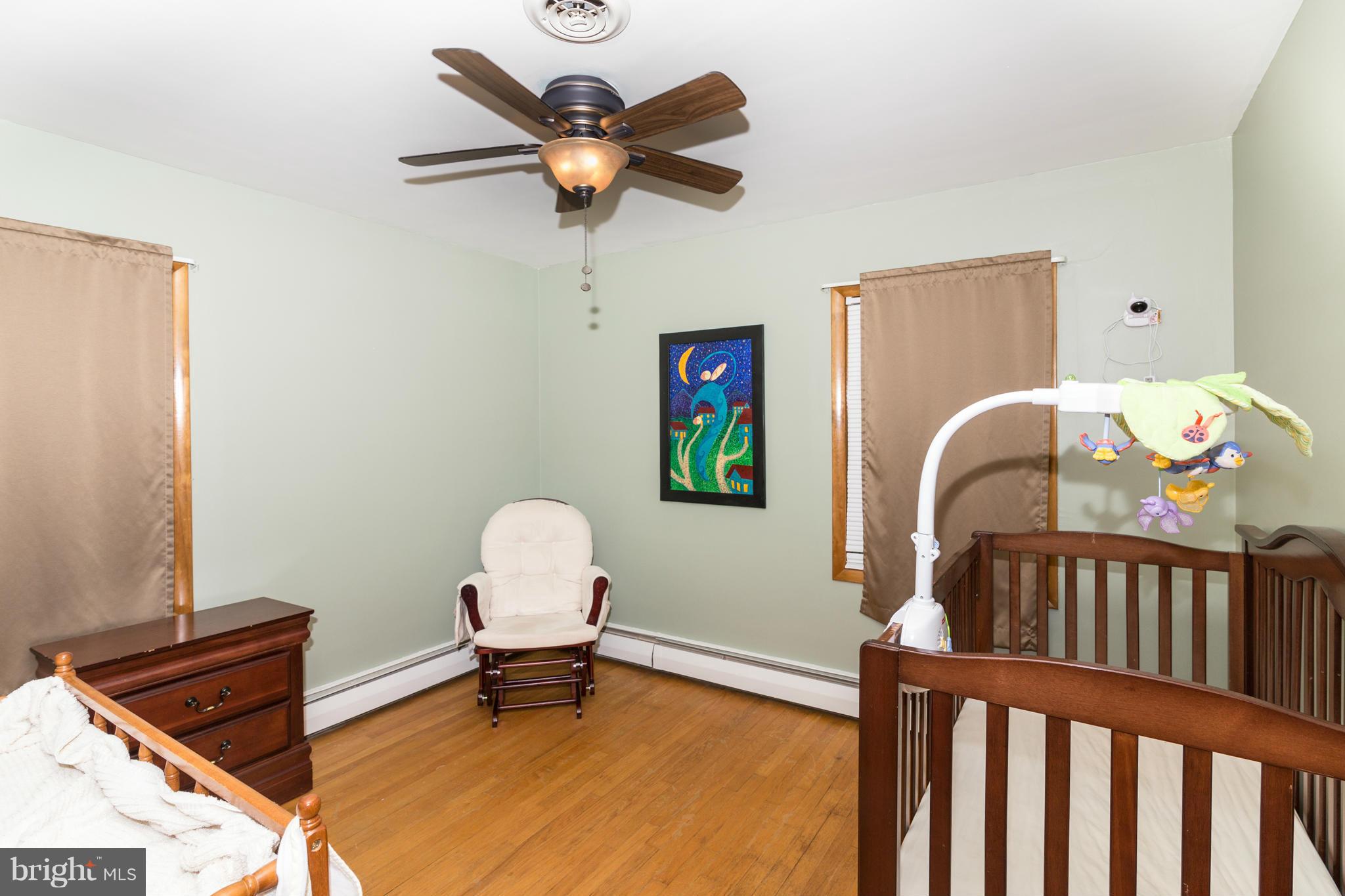 4201 Buffalo Road Mount Airy, MD 21771 - Photo 19 of 29 a bedroom with furniture and a window