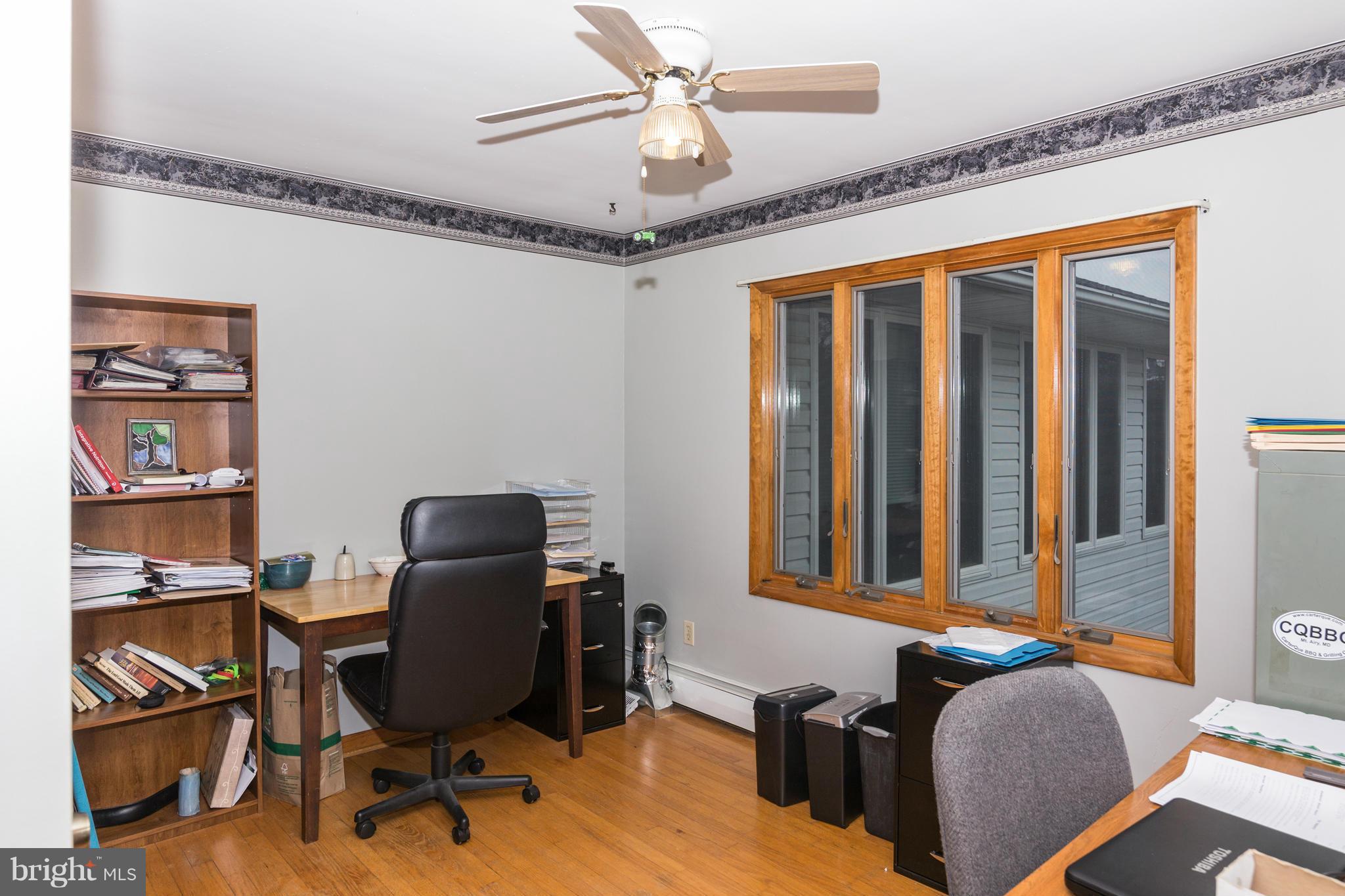 4201 Buffalo Road Mount Airy, MD 21771 - Photo 20 of 29 a view of a workspace with furniture and a window