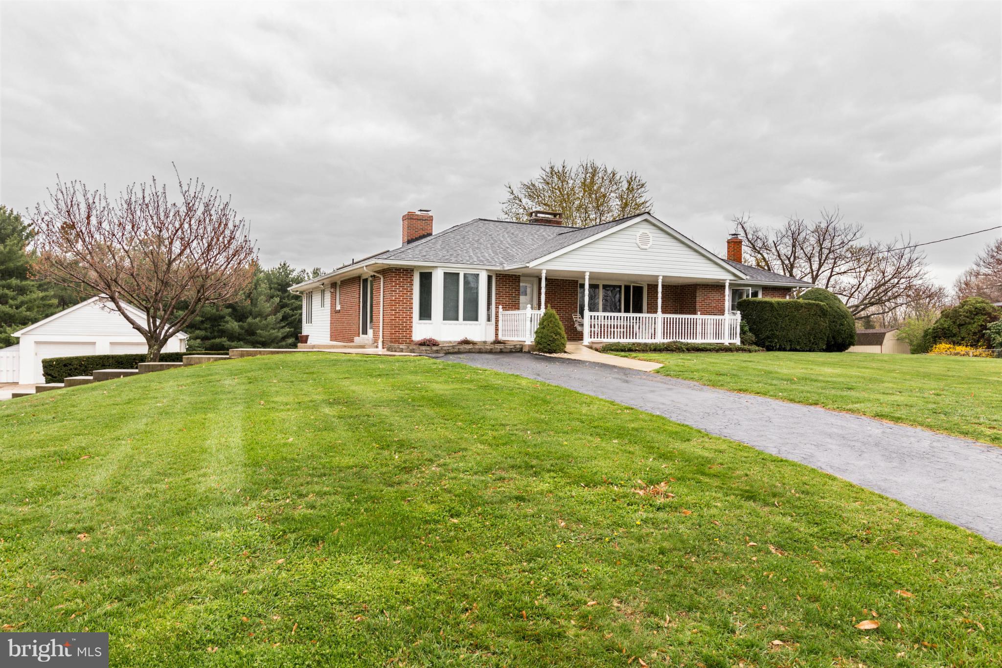 4201 Buffalo Road Mount Airy, MD 21771 - Photo 3 of 29 a front view of a house with garden