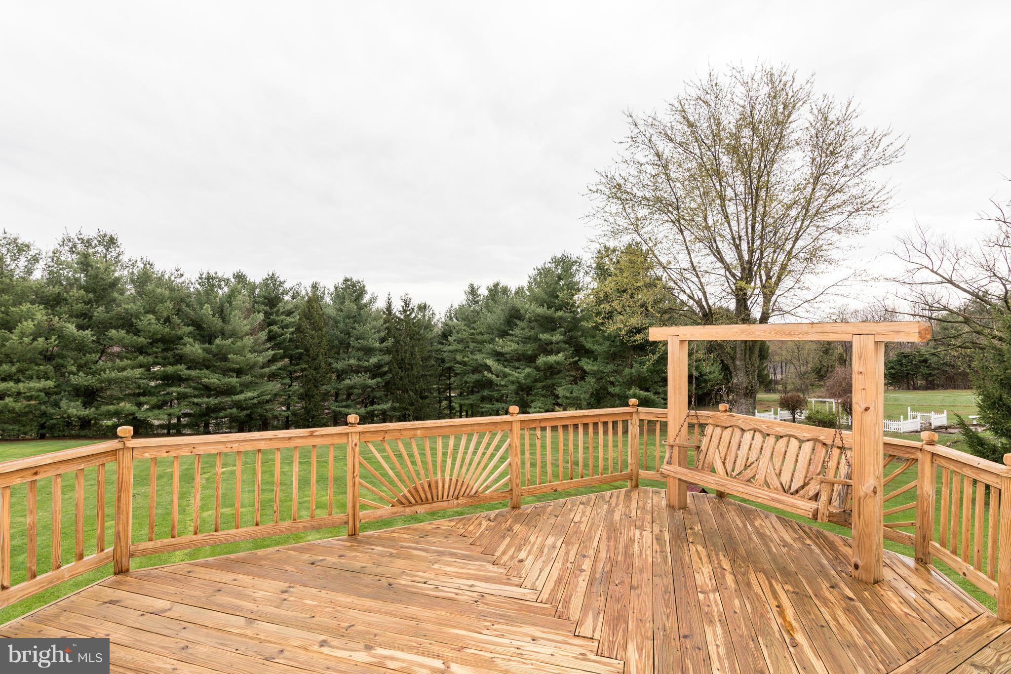 4201 Buffalo Road Mount Airy, MD 21771 - Photo 25 of 29 a view of a balcony with wooden floor and fence