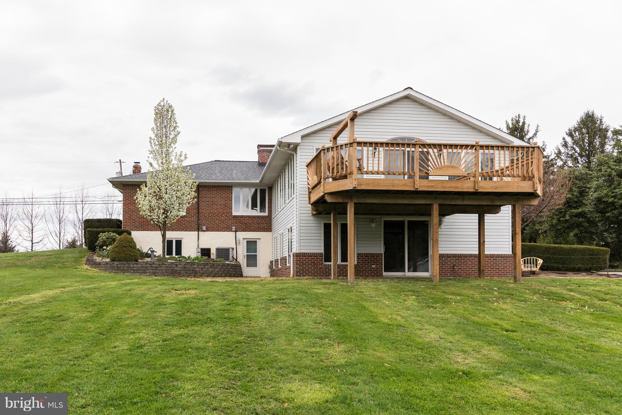 4201 Buffalo Road Mount Airy, MD 21771 - Photo 5 of 29 a view of a house with a yard and pathway