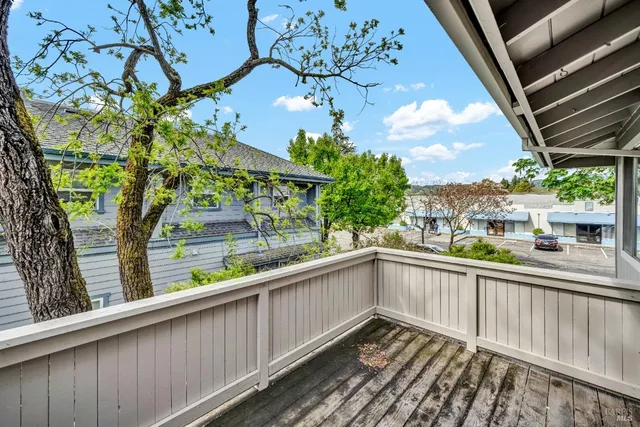 a view of a balcony with an outdoor space
