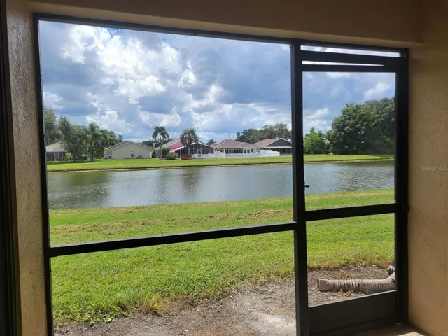 a view of a lake from a window
