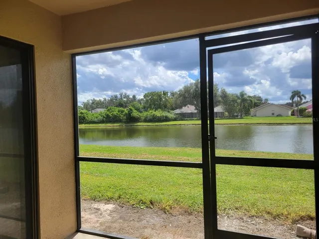 a view of a lake from a window