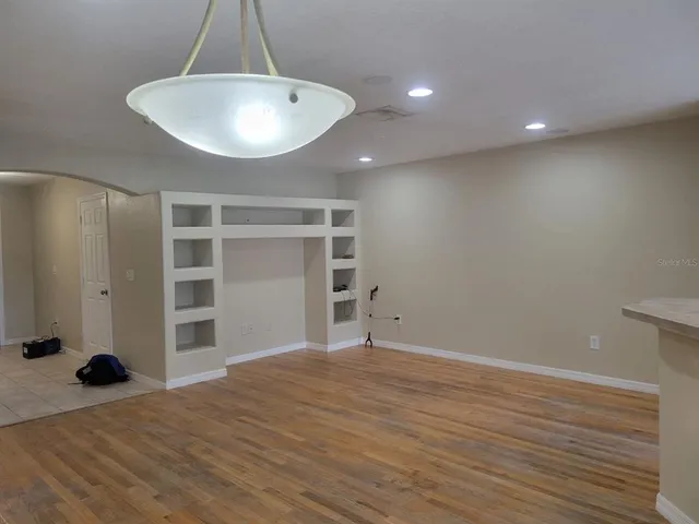 a view of a livingroom with a staircase