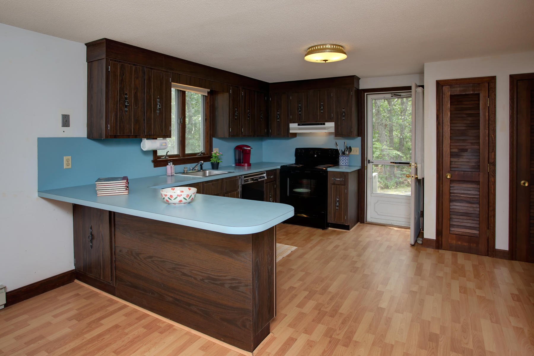 21 Oak Ridge Road East Sandwich, MA 02537 - Photo 13 of 31 a kitchen with a sink cabinets and window