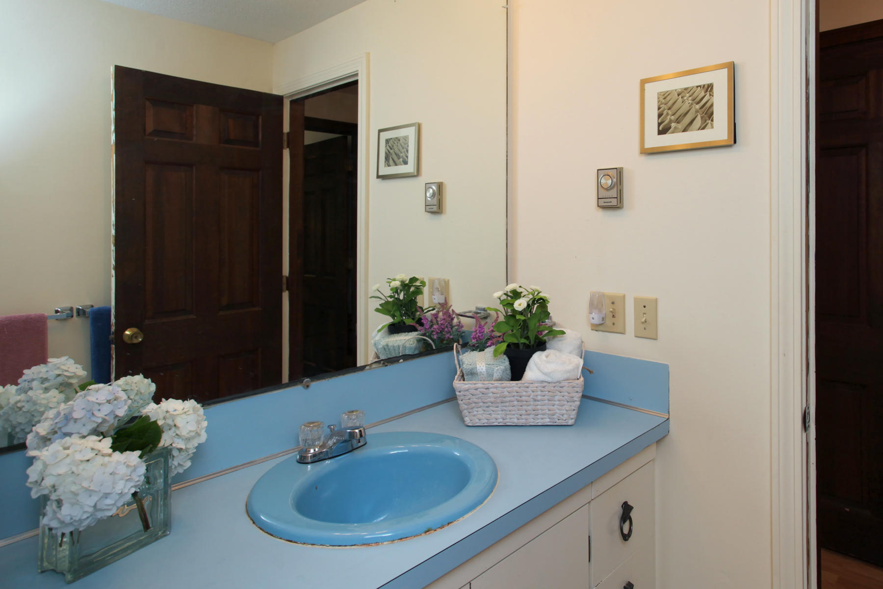 21 Oak Ridge Road East Sandwich, MA 02537 - Photo 17 of 31 a bathroom with a sink and a mirror