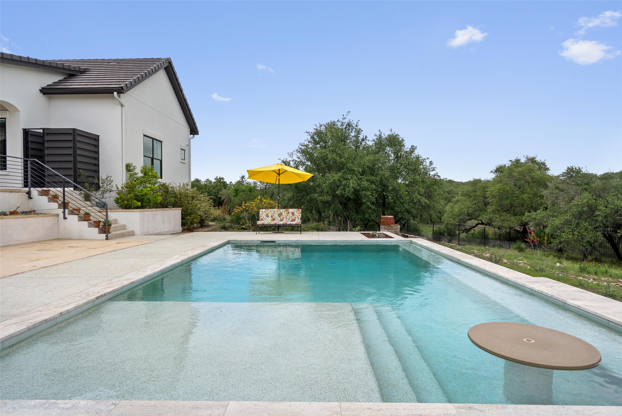1805 Performer Road Spicewood, TX 78669 - Photo 1 of 40 Hill country paradise in a gated community on 7.5 acres located on the deep side of the Pedernales river in Spicewood