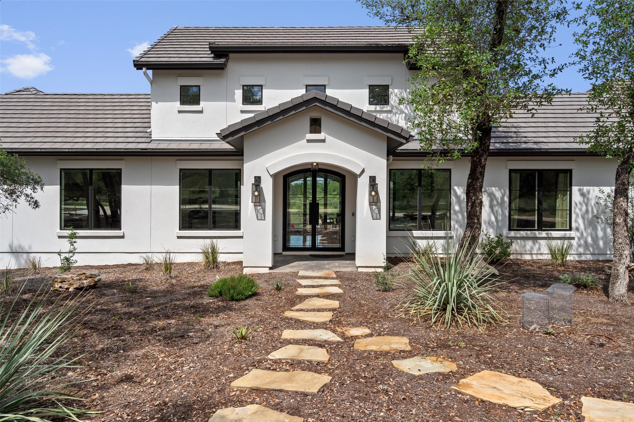Welcome home to Paleface Ranch! This custom built Silverton home blends modern Hill country design with clean lines and warm curb appeal